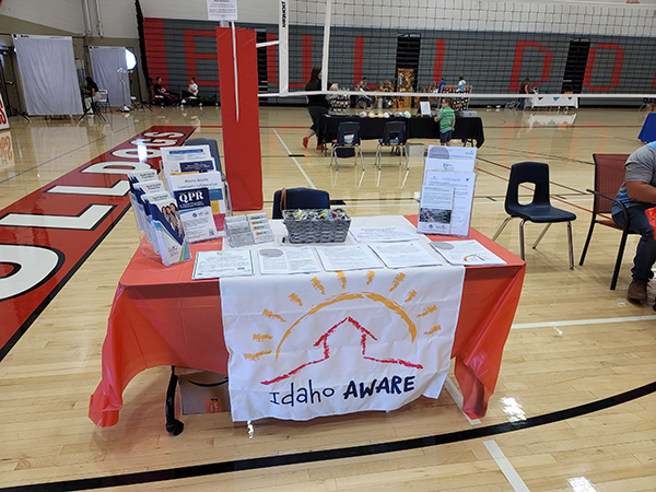 An Idaho AWARE table set up for an event in the Kimberly Middle School gym. Click to enlarge.